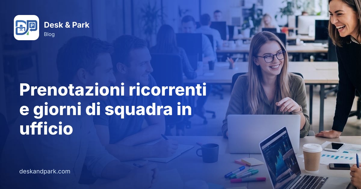 Un team ride e lavora insieme a un tavolo condiviso in un open space